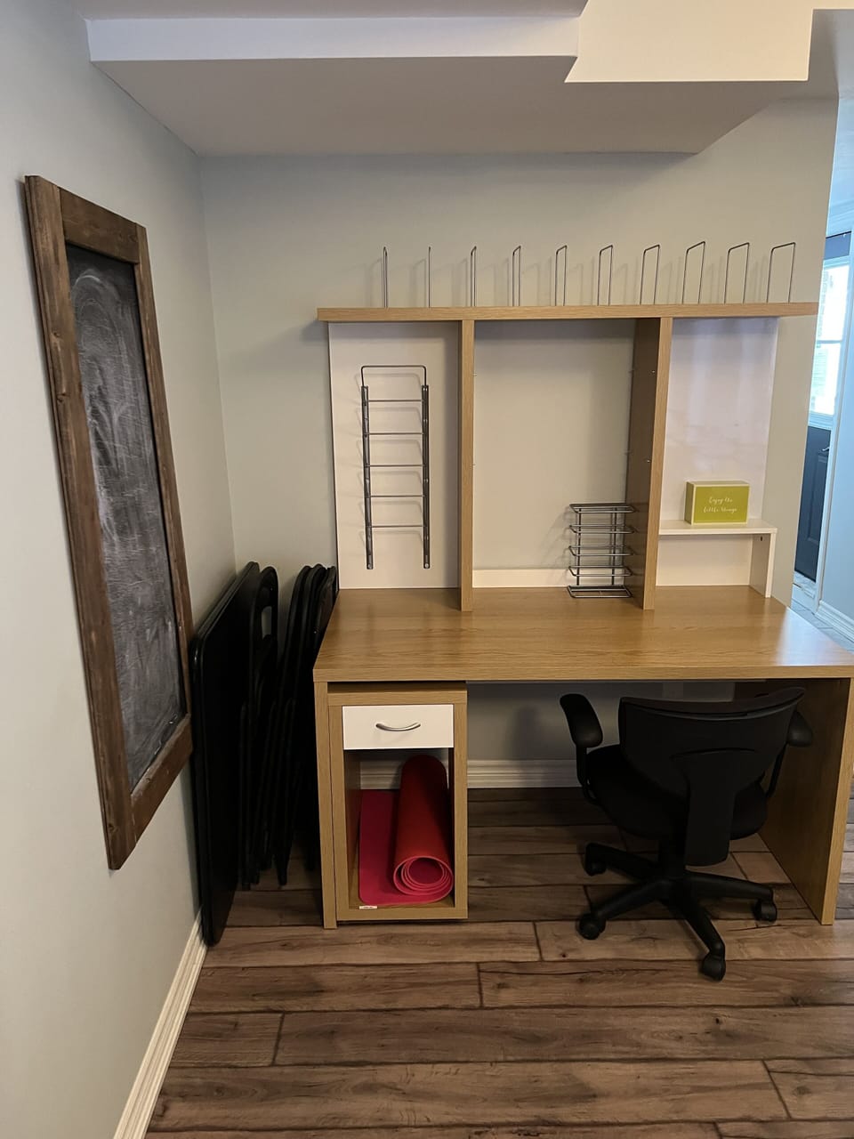 Desk and chair -workstation. Yoga mat. lower level