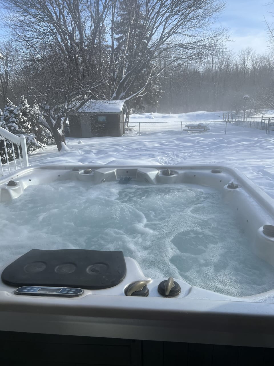 Hot tub facing the canal. Large fenced backyard