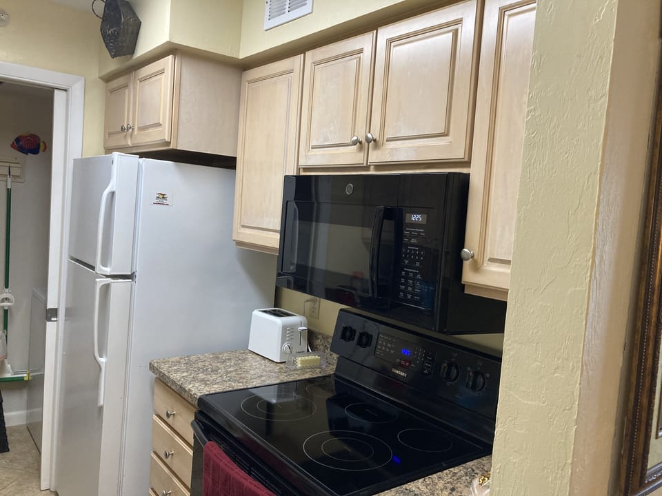Galley kitchen with all the appliances