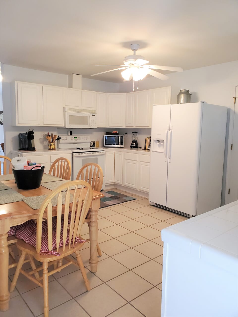 Large fully stocked kitchen with plenty of room to cook meals if you choose.
