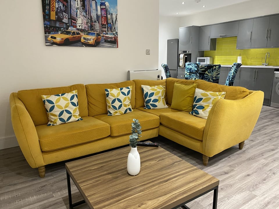 Whether you're watching TV, reading a book, or simply lounging, the living room offers a warm and homely vibe that makes it easy to settle in and feel at ease.