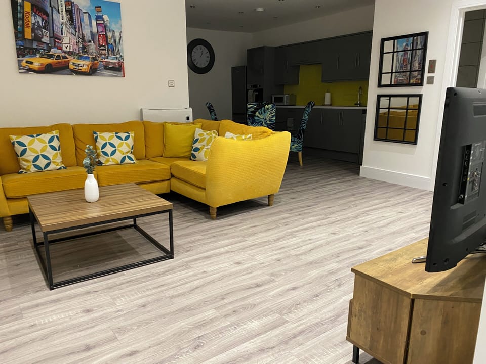 Whether you're watching TV, reading a book, or simply lounging, the living room offers a warm and homely vibe that makes it easy to settle in and feel at ease.