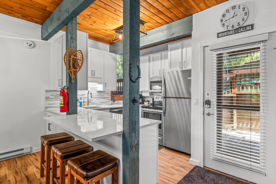 Enjoy cooking in this recently updated kitchen that is stocked with all the supplies you will need to make a meal after a fun day out!