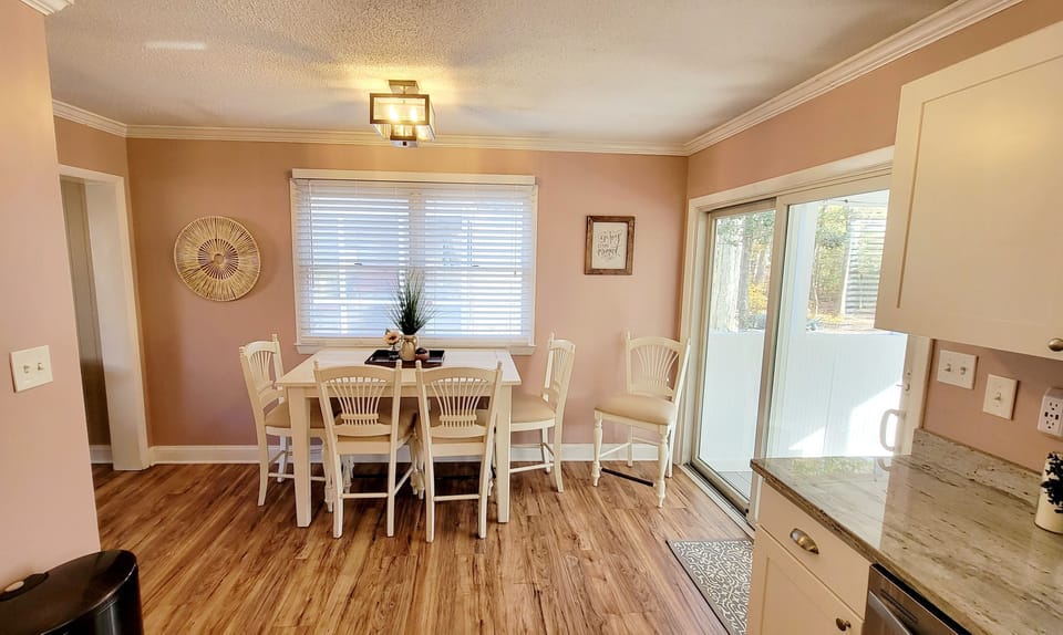 Extra leaf for table to extend to seat 6 for family game nights in laundry area
