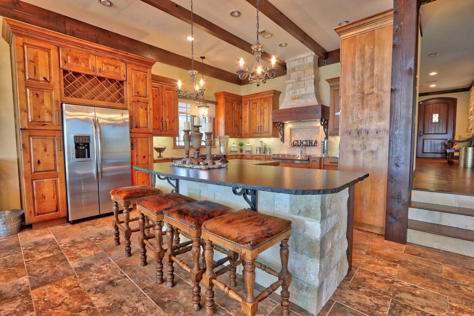 The kitchen features bar seating.