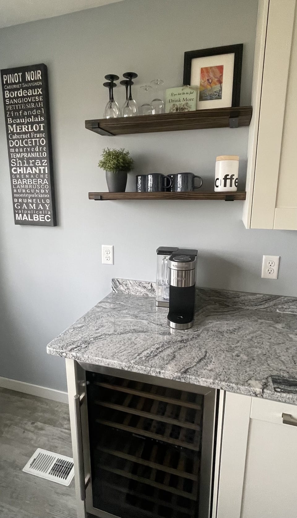 We have a Kuerig and a wine fridge!