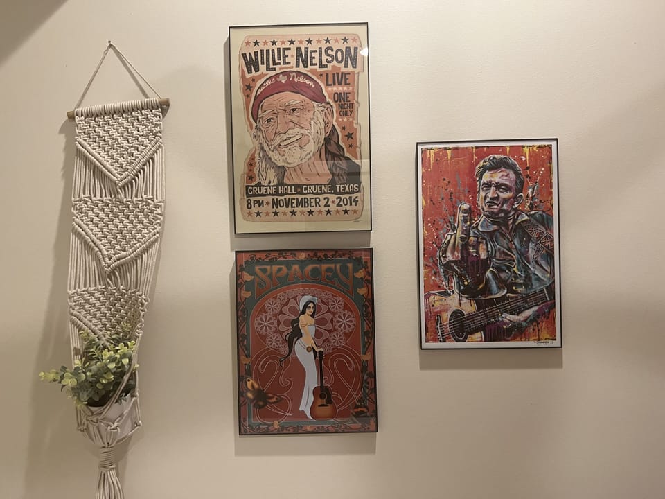 Some nashville favorites on our small gallery wall above the bed. 