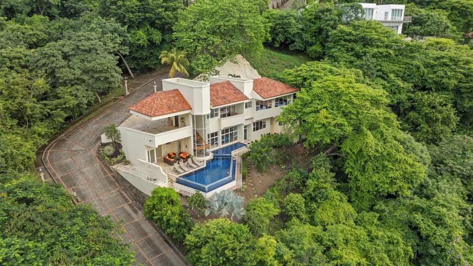 Casa Ventanas sits perched on the hillside in the gated development of Monte Paraiso.