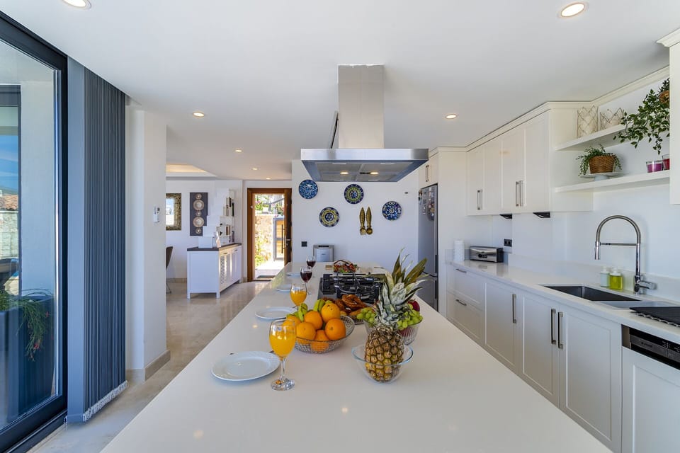 Open plan fully fitted kitchen with an island unit
