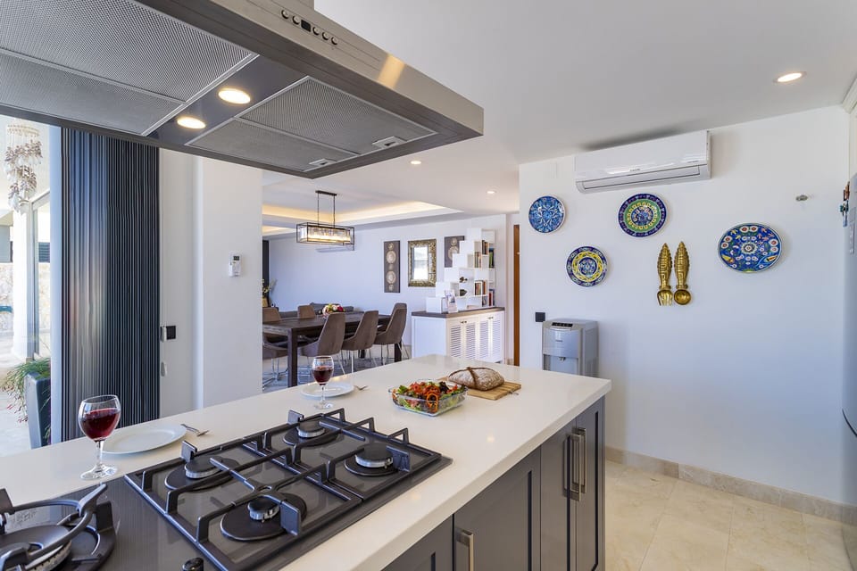 Open plan fully fitted kitchen with an island unit