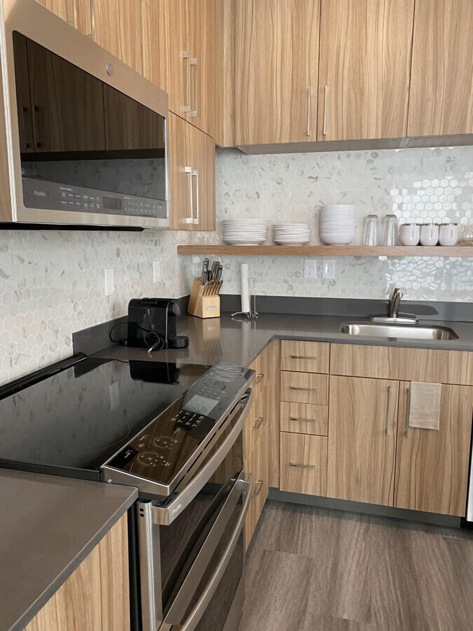 Kitchen with Microwave, Electric Range, and Convection Oven