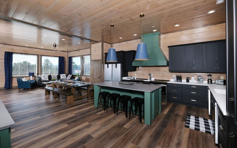Large Kitchen with Island Seating and a Dinning Room Table