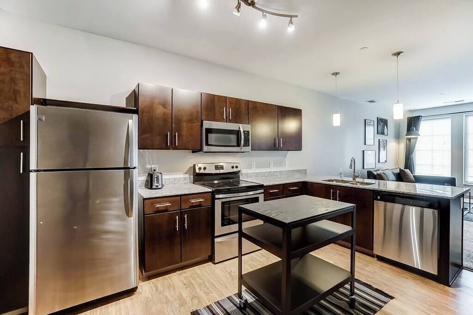 Kitchen Features:
- Island with storage
- Dishwasher
- Stainless steel stove
- Stainless steel oven
- Stainless steel refrigerator 
- Keurig Coffee maker
- Toaster
- Blender
- Pots and pans
- Dinning ware