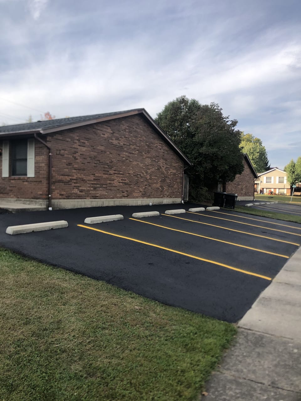 Side paved parking lot a few steps your front door..