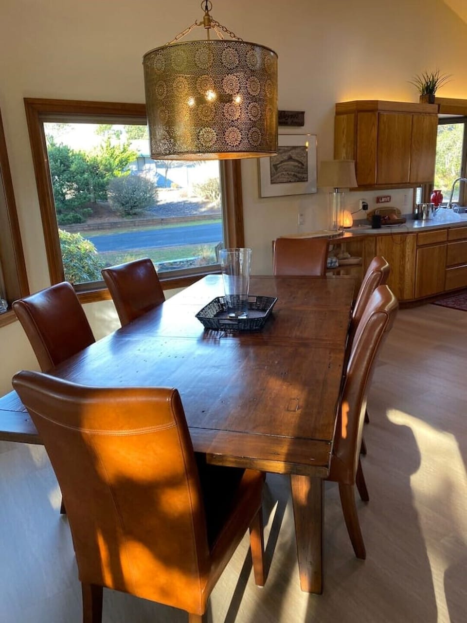 Spacious dining table with leather chairs. Use our extra seating to seat 10. 