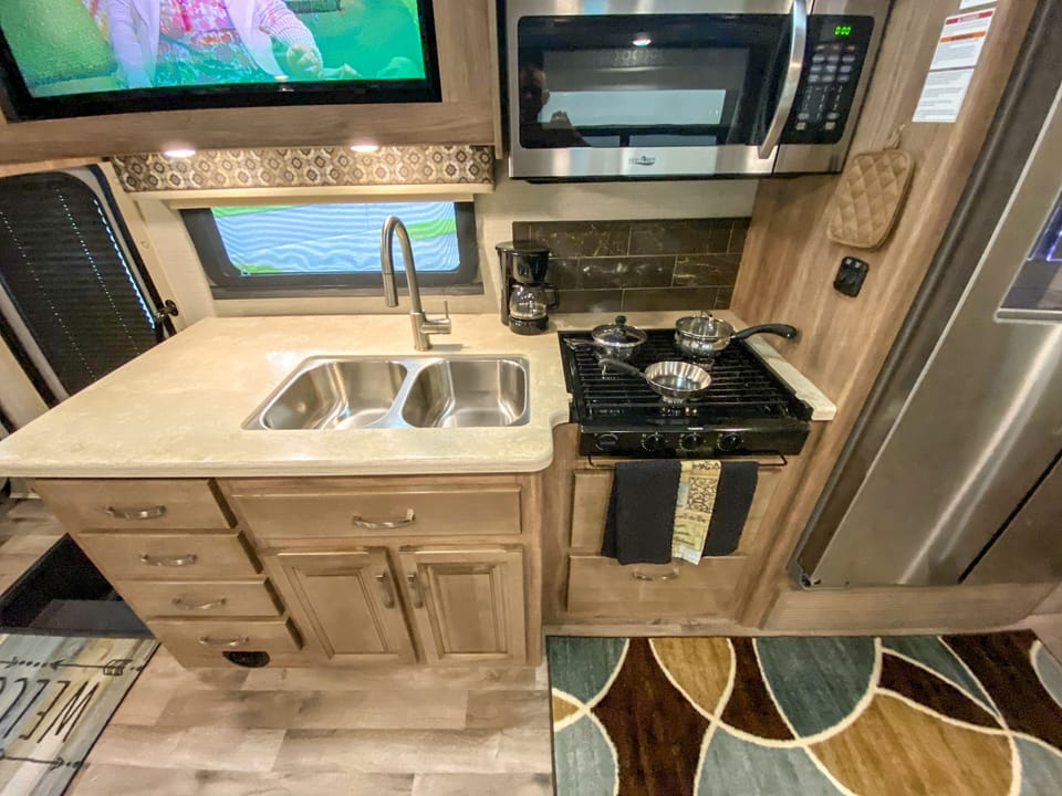 Kitchen - dual deep sink, 3 burner stove, microwave/convection oven combo