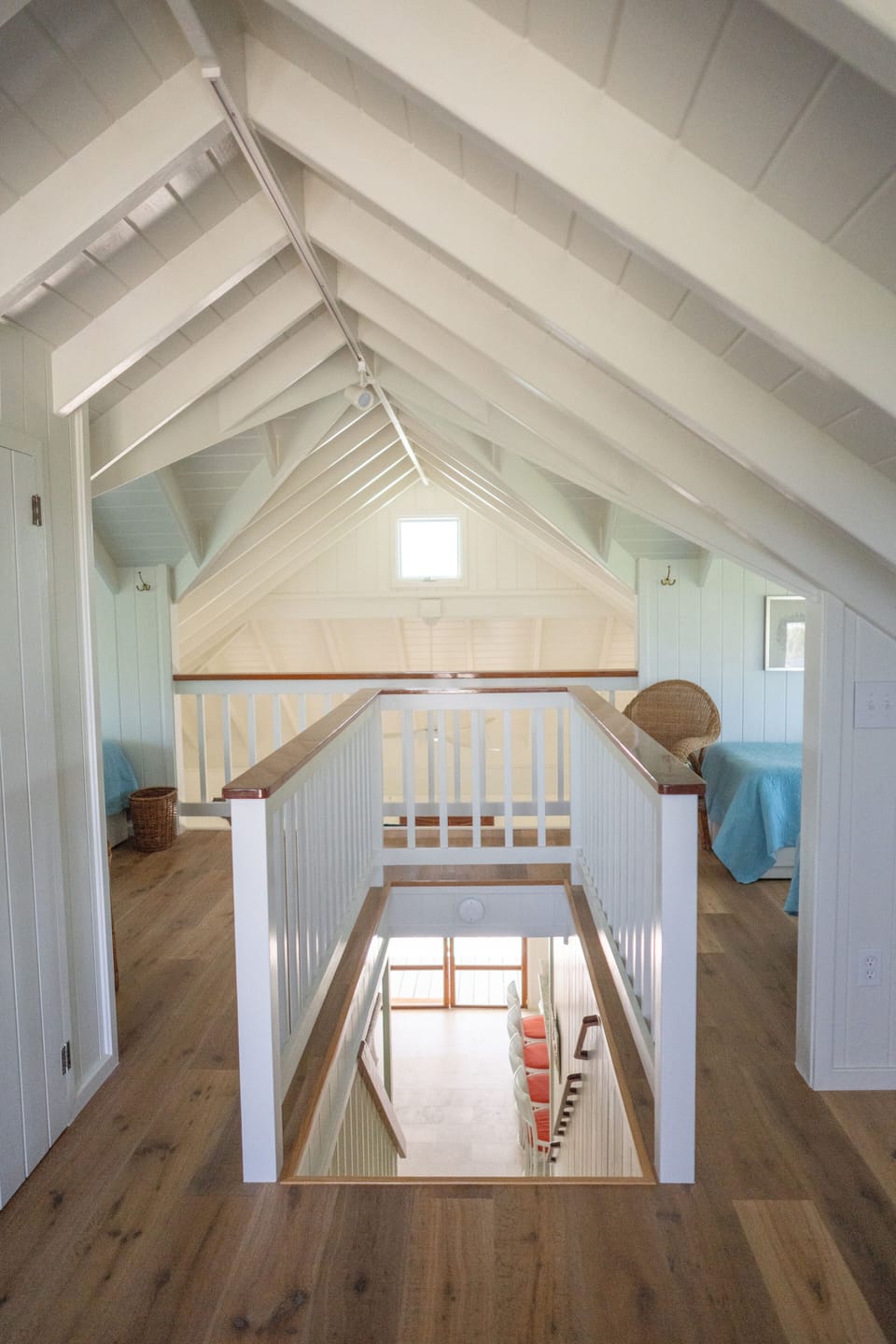Upstairs air conditioned loft has 4 twin beds and 1/2 bath with study area