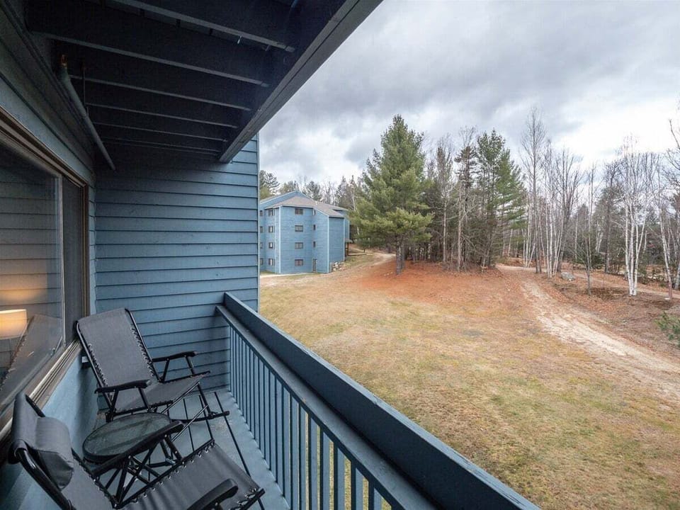 relax on the deck with wooded views