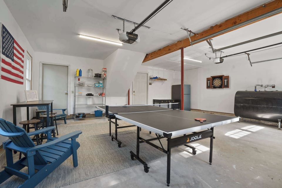 Game room with table tennis and lounge seating