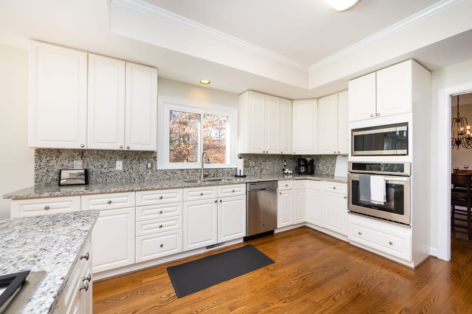 Enjoy the large kitchen and views from the window, with luxury touches