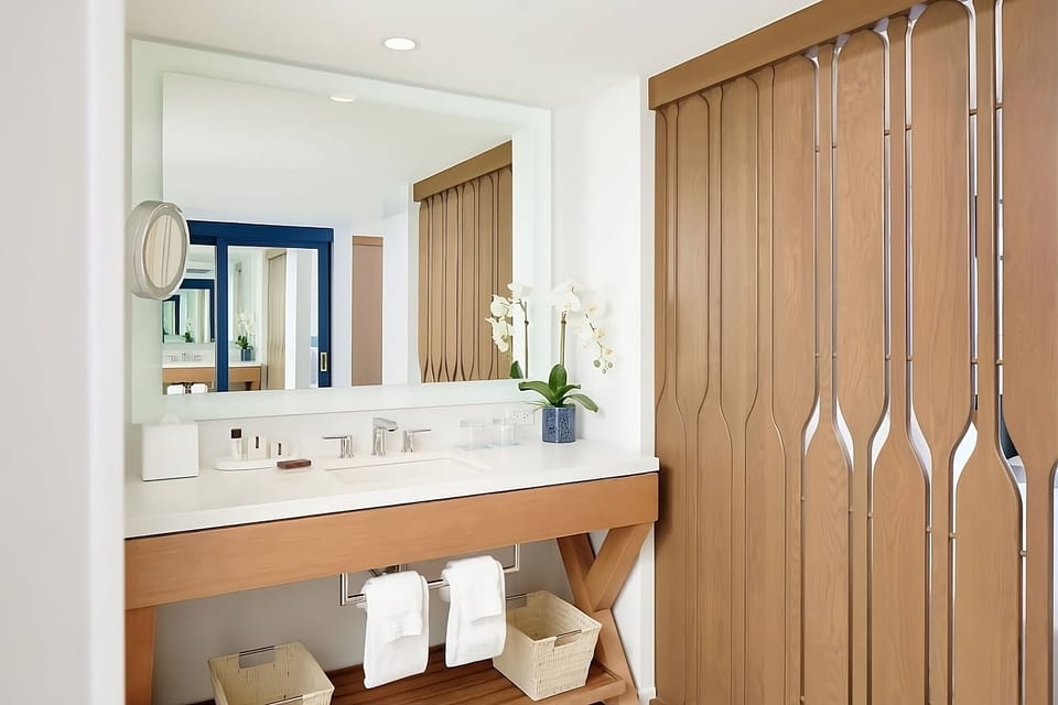Unwind at a spacious vanity with spa-like lighting.