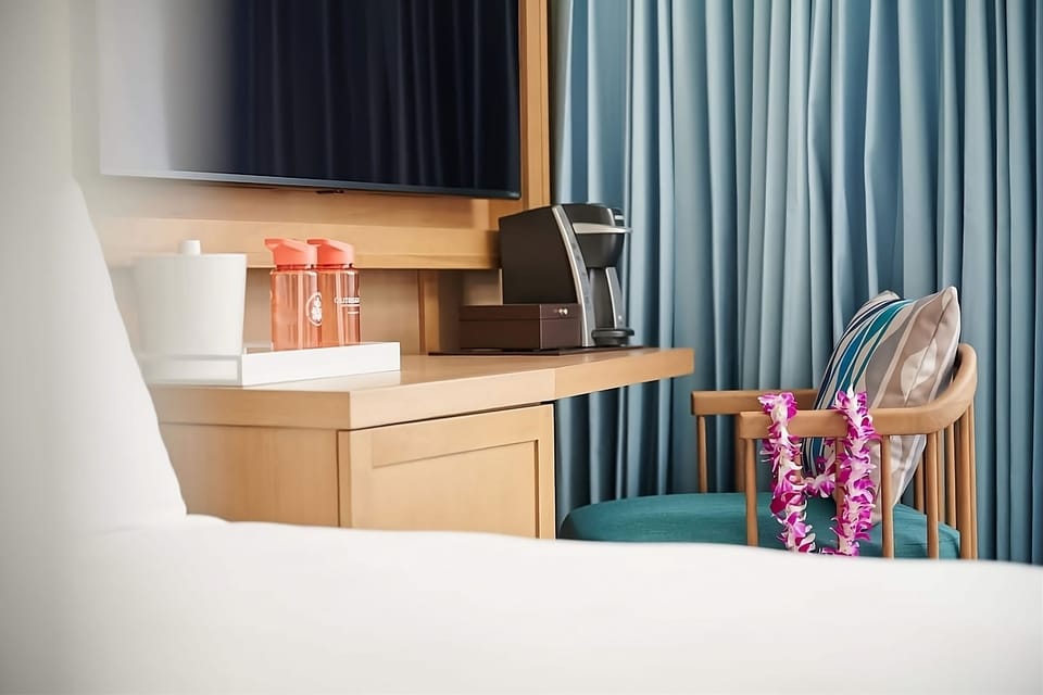 Recharge with in-room coffee and a convenient work counter.