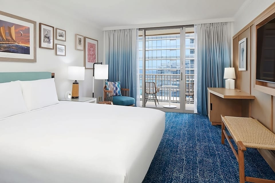 Lounge by the window, then step out to the balcony.