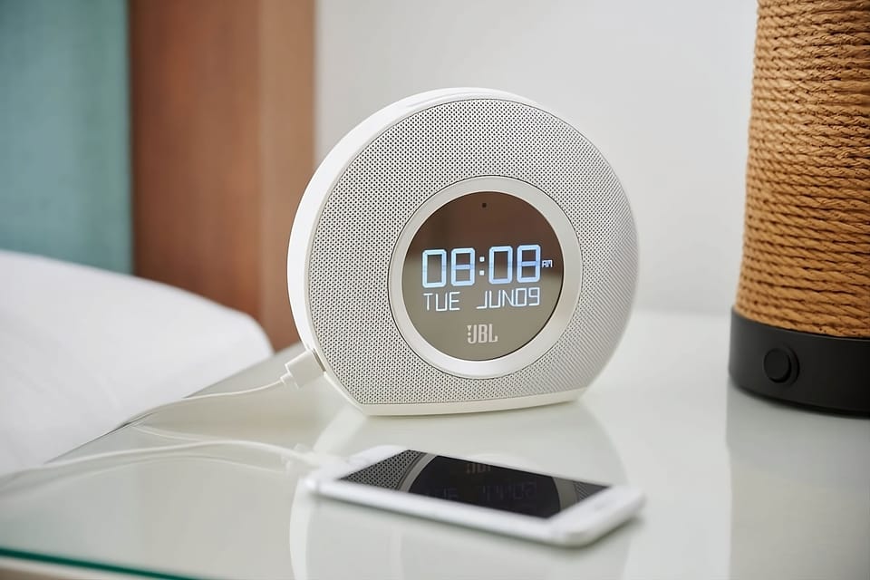 Wake gently with bedside charging and an easy-to-read clock.
