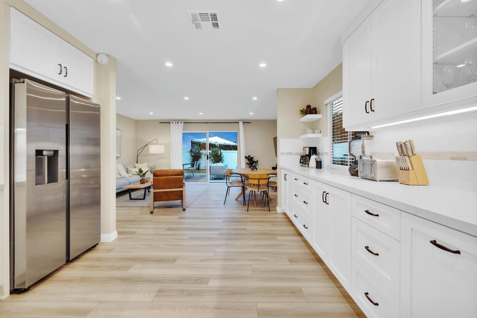 Entertainers kitchen flows effortlessly into living space and outdoor living room.