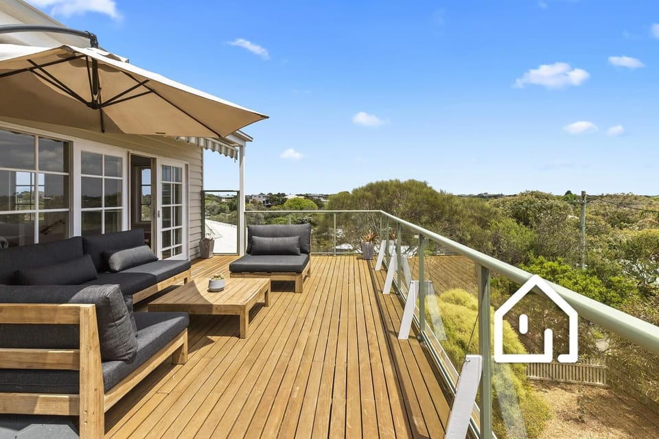 The upper deck captures expansive coastal and bay views