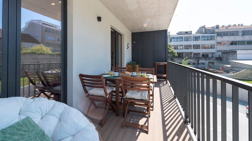 Enjoy sunny breakfasts and quiet evenings on this inviting balcony, complete with comfortable outdoor seating and city views.
#Balcony #OutdoorDining #LovelyStay