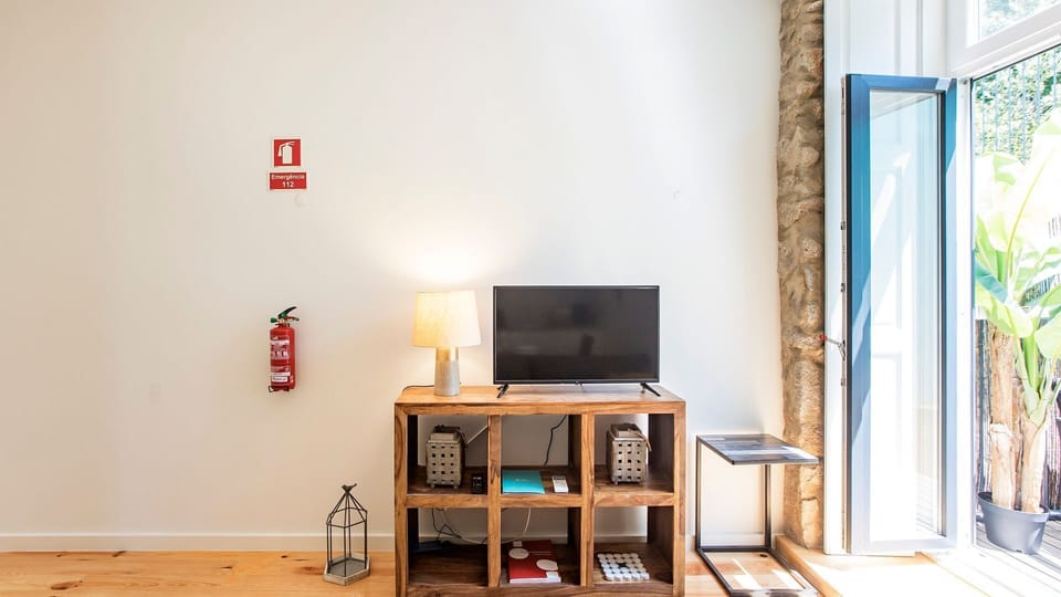 Bright Living area with TV #porto #airbnb