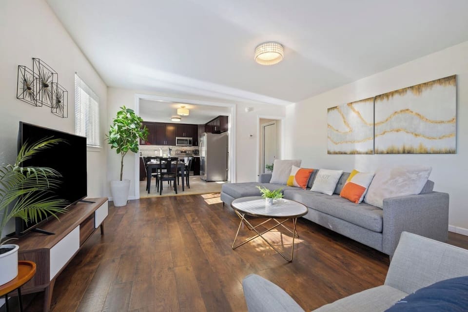 Enjoy watching your favorite shows on our TCL Smart TV on our huge comfy sofa.