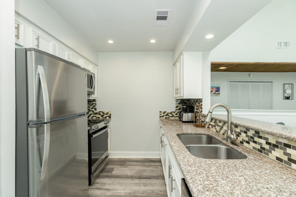 Fully equipped kitchen with stainless steel appliances