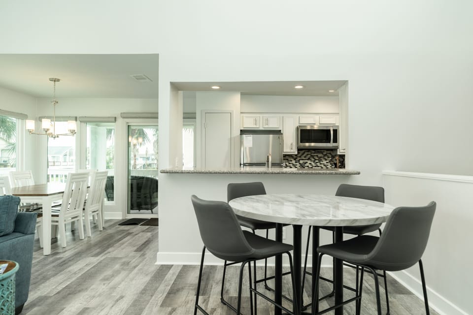 One dining table sitting four - great for snacks or breakfast