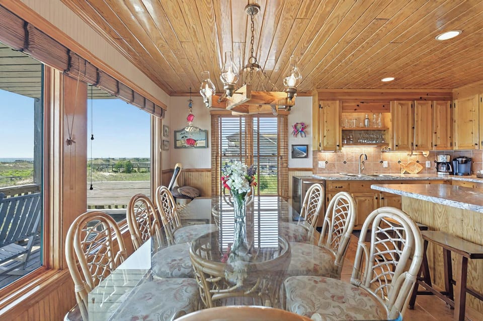 Dining Room Area with view of the pool, dunes and ocean 