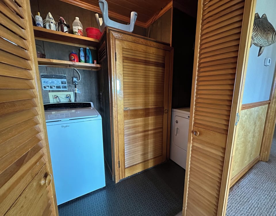 Laundry room, located in the house. Board Games and First Aid kit in this room  