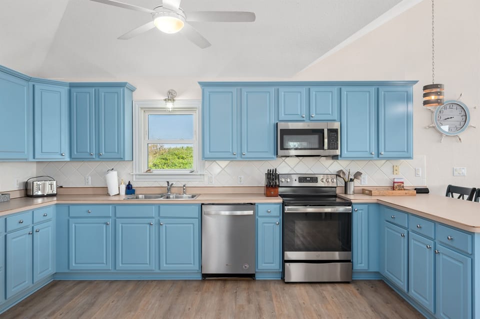 Enjoy generous counter space, updated appliances, and a large open layout.