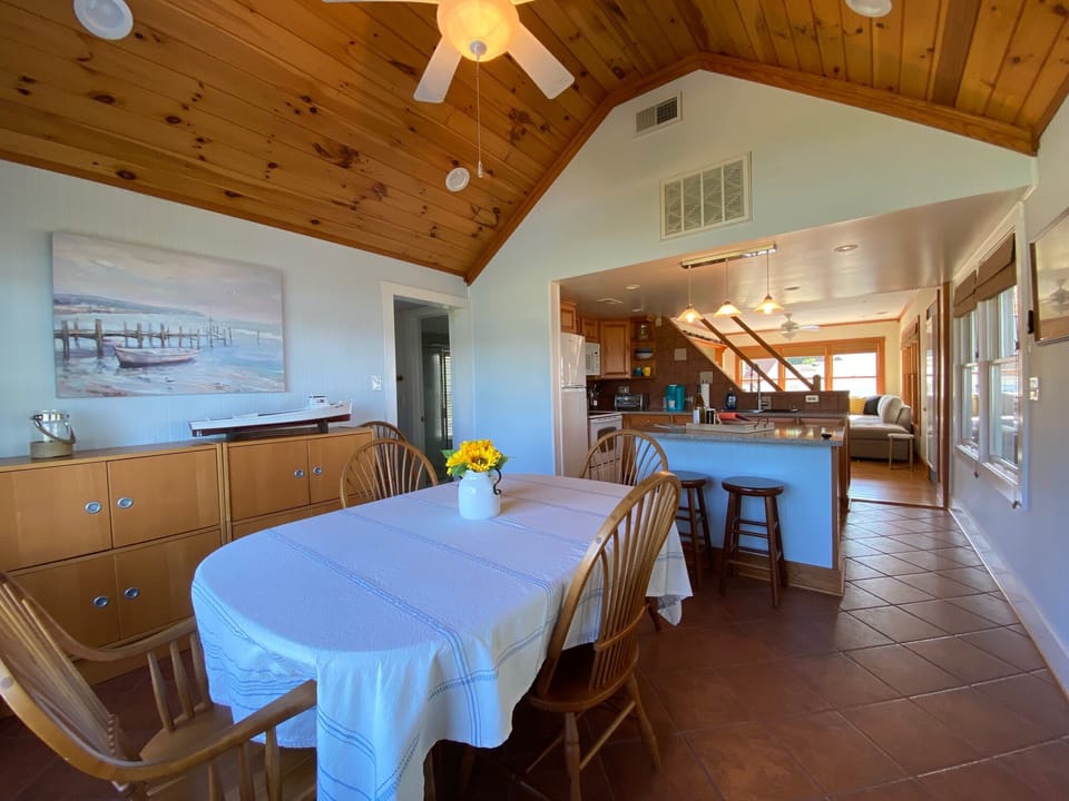 Kitchen open to dining and living.