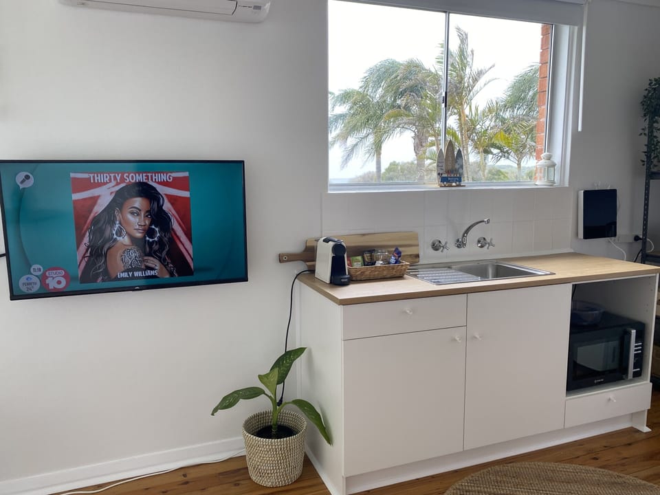 Watch TV whilst having a meal. Catch up on the news during breakfast or dinner.