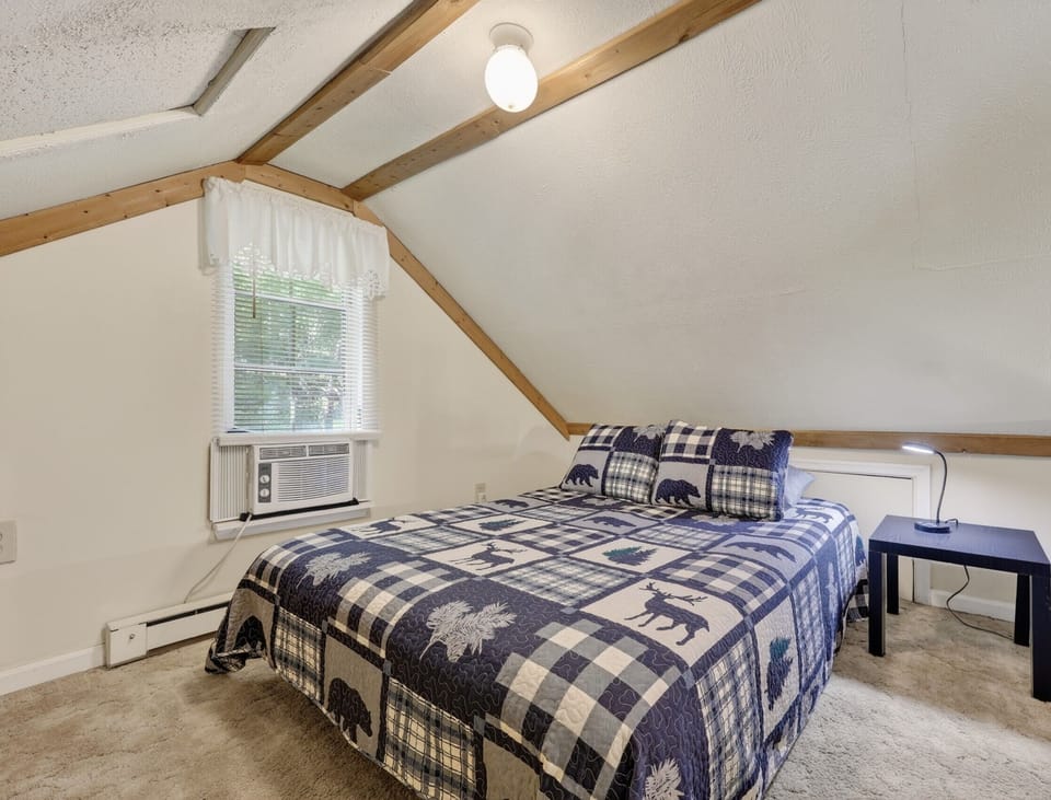 Cozy loft sleeping area offers extra space to rest and recharge.