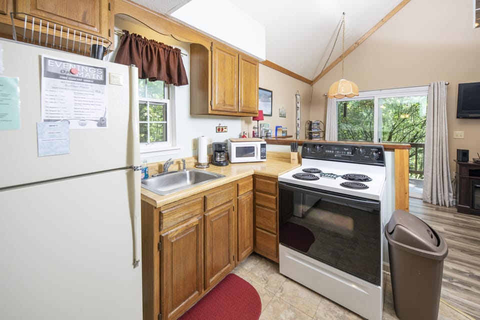 fully equipped kitchen with everything needed to fix meals for stay in dining