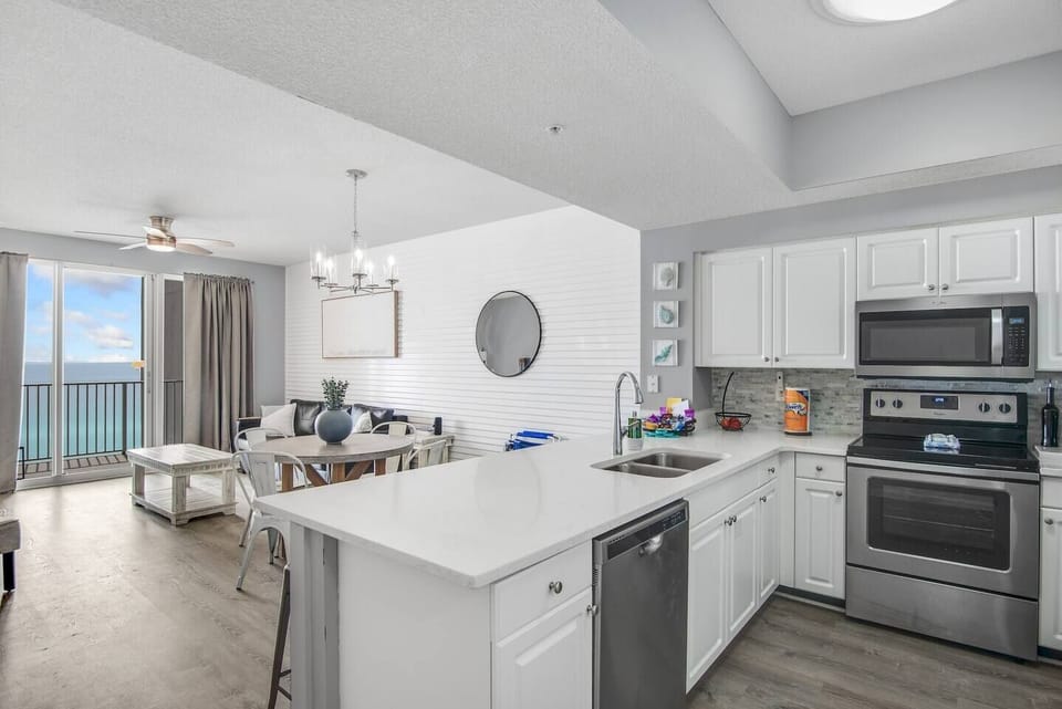 The recently completed remodel includes a custom kitchen with new appliances, countertops, and tile work. The kitchen is fully stocked with "more than the basics" so you and your group can prepare delicious meals while overlooking the Gulf of Mexico in you