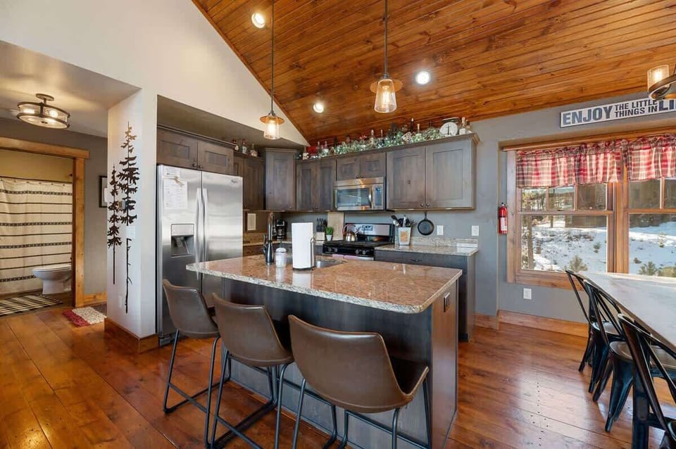 Kitchen with bar stool seating for 3