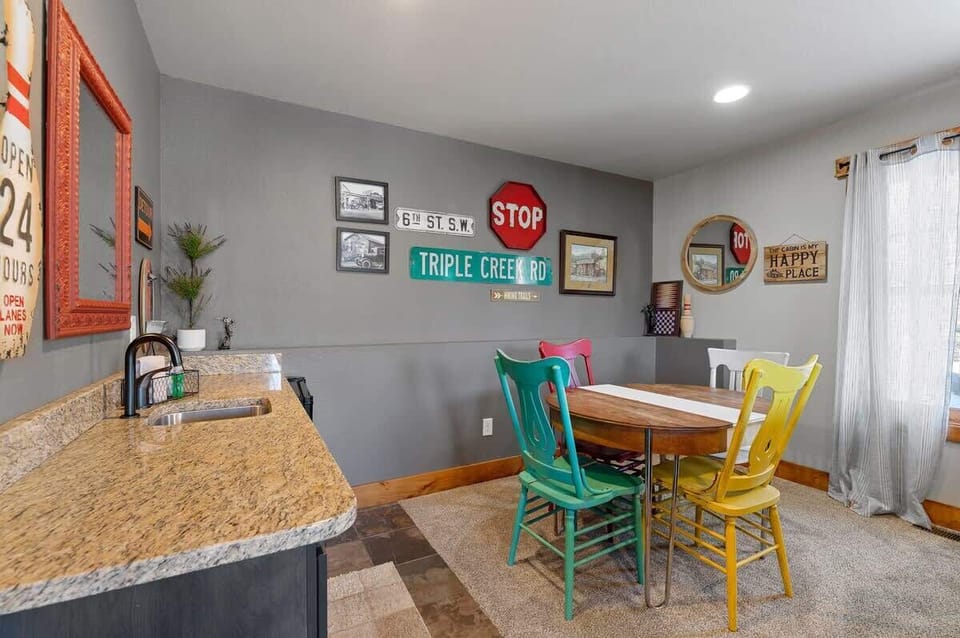 Downstairs game area with wet bar