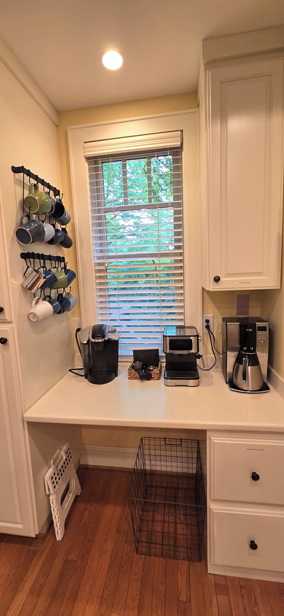 kitchen coffee bar features drip, Keurig, and Espresso coffee makers
