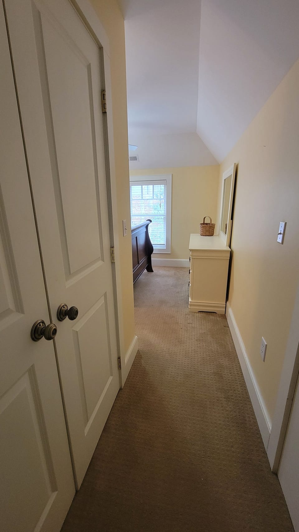 Hallway with large closet in upstairs bedroom w/ensuite offers extra privacy 