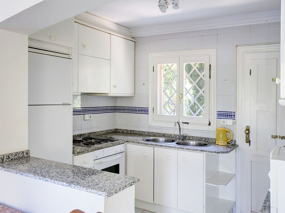 Cabinetry, Countertop, Kitchen Sink, Sink, Tap, Kitchen Stove, Kitchen, Kitchen Appliance, Window, Gas Stove