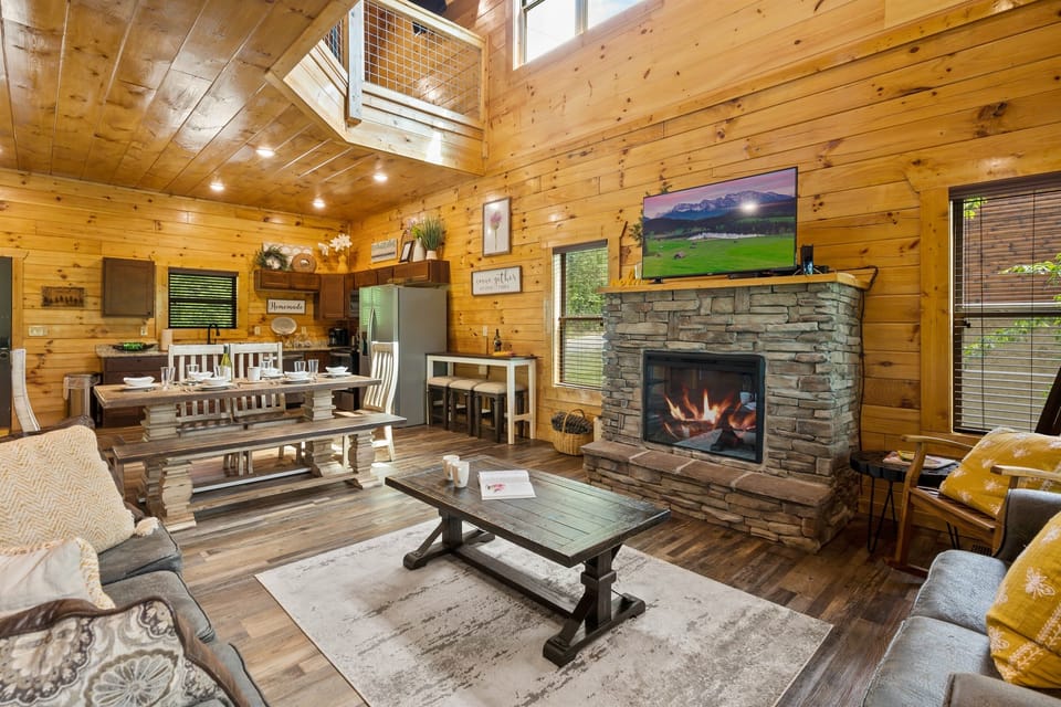 Get ready to be wowed by our stunning open concept living space, complete with everything you need to make your cabin stay unforgettable.
