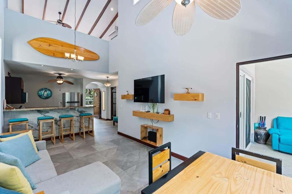 Relax in this airy, open space perfect for connecting with loved ones.
